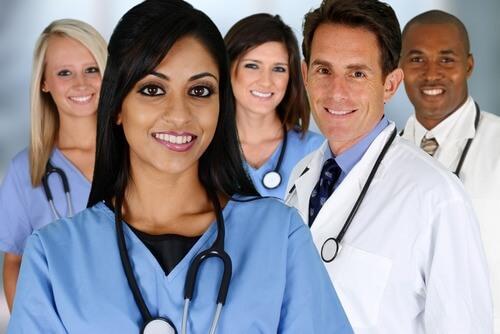 Group of doctors and nurses in a hospital. Photo courtesy of Shutterstock.
