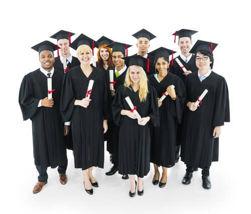 Graduates holding diplomas. Photo courtesy of Shutterstock. 
