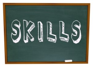 The word "skills" on a chalkboard. Photo courtesy of Shutterstock.