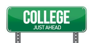 Green sign saying College Just Ahead