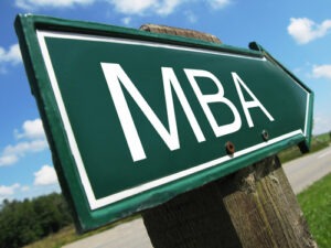 A green MBA road sign