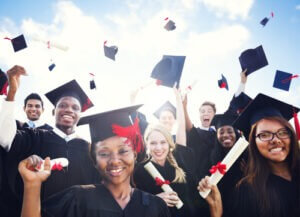 Group of diverse students celebrating graduation