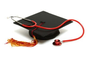 Graduation cap and stethoscope representing medical graduate