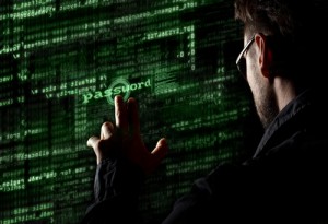 Silhouette of a hacker uses a command on graphic user interface 