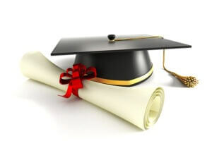 3d image of mortar board with degree against white background