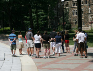 Group of people taking tour of university
