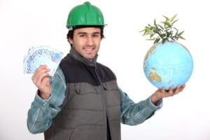 Tradesman holding a globe and a wad of money