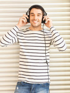 Man in casual clothes with headphones