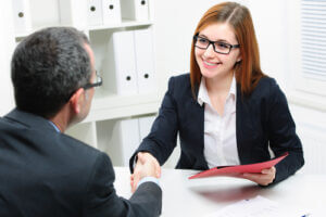 job applicant having interview. handshake while job interviewing