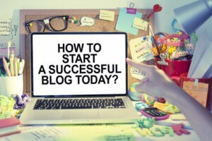 How to start a successful blog today note on laptop courtesy of Shutterstock.com